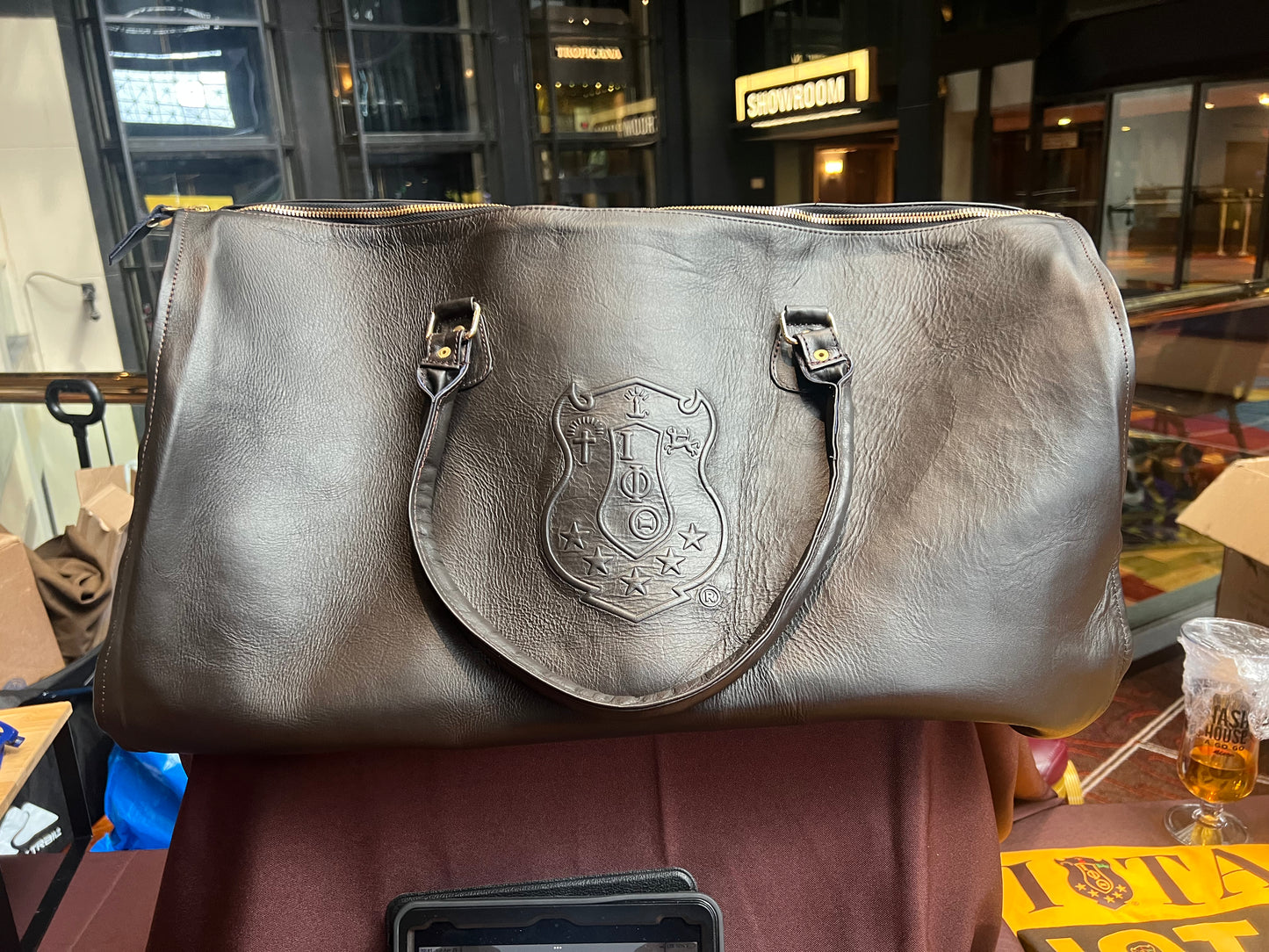 PRE-ORDERED ITEM: Genuine Leather Traveling Suit Bag with Shoe Compartment featuring the Iota Phi Theta Shield