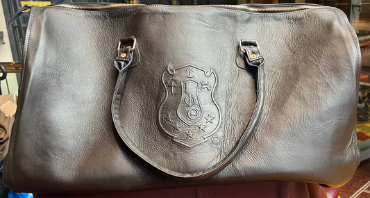 PRE-ORDERED ITEM: Genuine Leather Traveling Suit Bag with Shoe Compartment featuring the Iota Phi Theta Shield