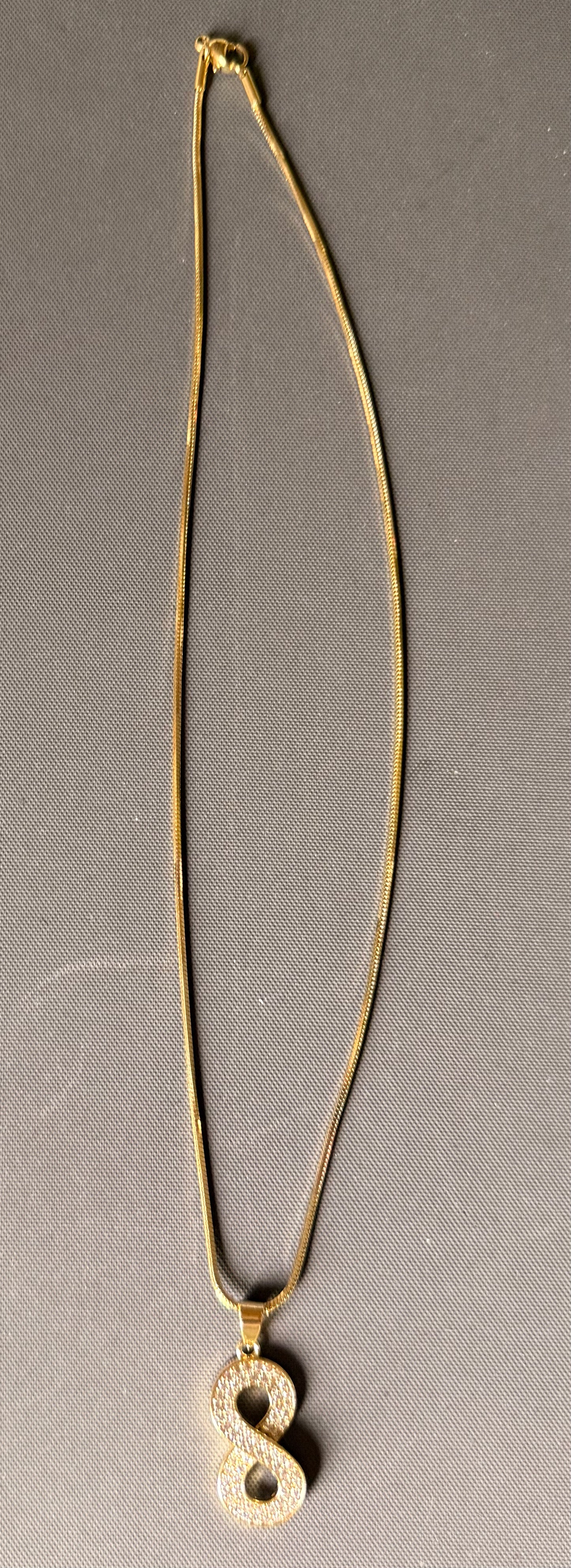 Snake Chain with Gold and Jewel Number 8 Pendant